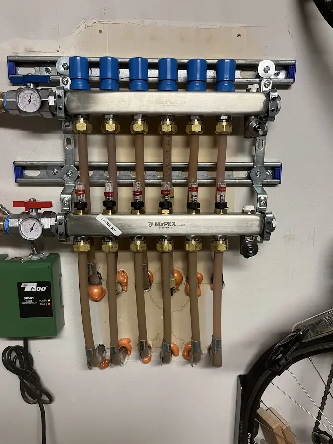 Plumber performing Gas Line Installation at a residential property in Bennington